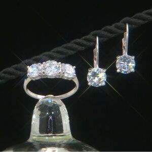 - Cubic Zirconia Rhodium Over SS Ring And Earrings Size 7